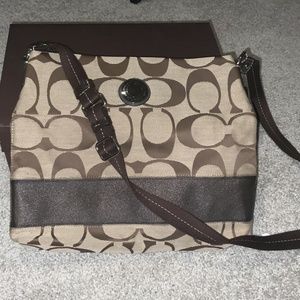 Coach handbag over shoulder brown and tan - like new